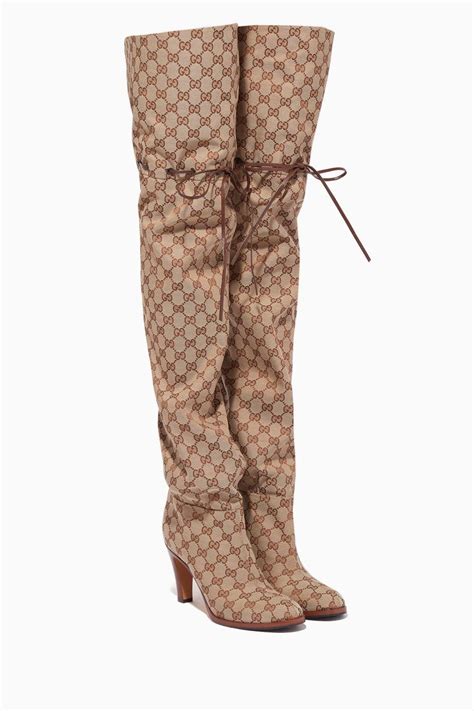 gucci thigh high boots outfit